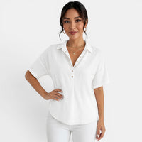 Elegante blusa de verano con botones y manga corta
