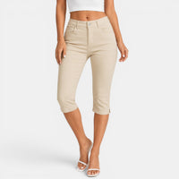 Refinado pantalón capri slim fit elástico con bolsillos y botones decorativos