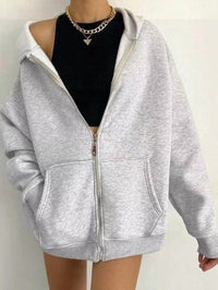 Sudadera de mujer con capucha oversize con cremallera y bolsillos prácticos