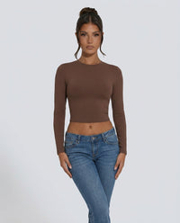 Camiseta crop deportiva de manga larga con cuello redondo para mujer