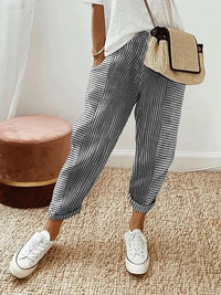 Estilosos pantalones baggy estampados de rayas con cintura elástica y caída fluida