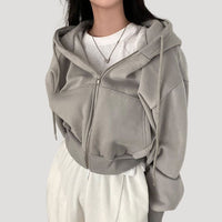 Sudadera de mujer corta con capucha y cremallera frontal