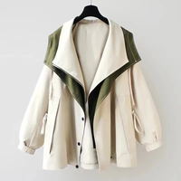 Abrigo de mujer tipo gabardina con capucha oculta y cintura ajustable