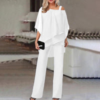 Elegante conjunto de mujer de dos piezas con top de hombros descubiertos y pantalón largo