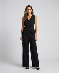 Conjunto de chaleco y pantalón ancho con bajo asimétrico para mujer