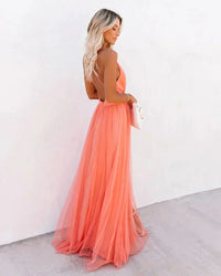 Refinado vestido largo naranja de fiesta y de noche con espalda descubierta y tirantes finos | Maxi