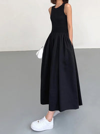 Elegante vestido de invitada de boda sin mangas con falda fruncida | Midi