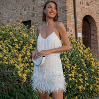 Estiloso vestido de fiesta con brillo de verano sin mangas | Midi