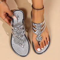 Elegantes sandalias planas de tira en T con pedrería y suela cómoda